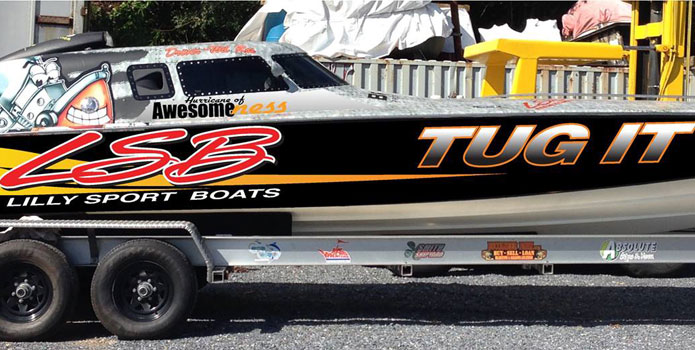 Graphic transformation from Tug It Racing to Hurricane of Awesomeness is underway for Smith's 30-footer.