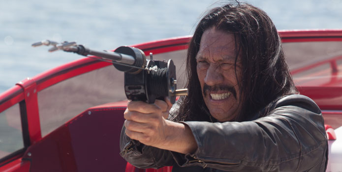 A 42’ Lightning and Danny Trejo make for one mean pairing in the new motion picture, “Machete Kills.” Photo Credit: Rico Torres/Distributor: Open Road Films."