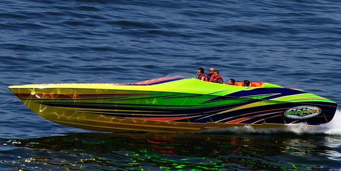 Water reflects on the boat and boat colors reflect on the water in this image from the 2013 Atlantic City Poker Run. Photo courtesy/copyright Tim Sharkey/Sharkey Images.