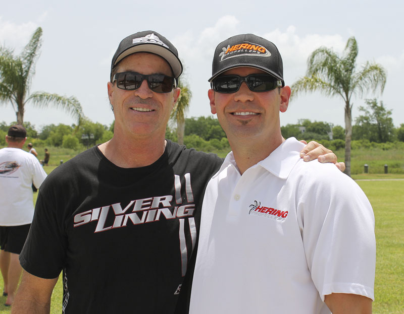 Jeff Johnston (right) joins Dave Hemmingson of Dave's Custom Boats at the Texas Outlaw Challenge in June.