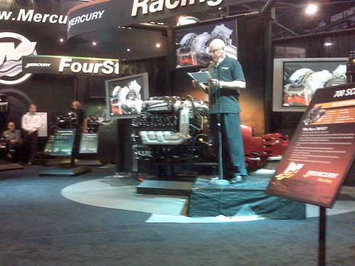 Fred Kiekhaefer, of Mercury Racing, shown here introducing the 1350 engine, a longtime Powerboat supporter and a scary smart guy.