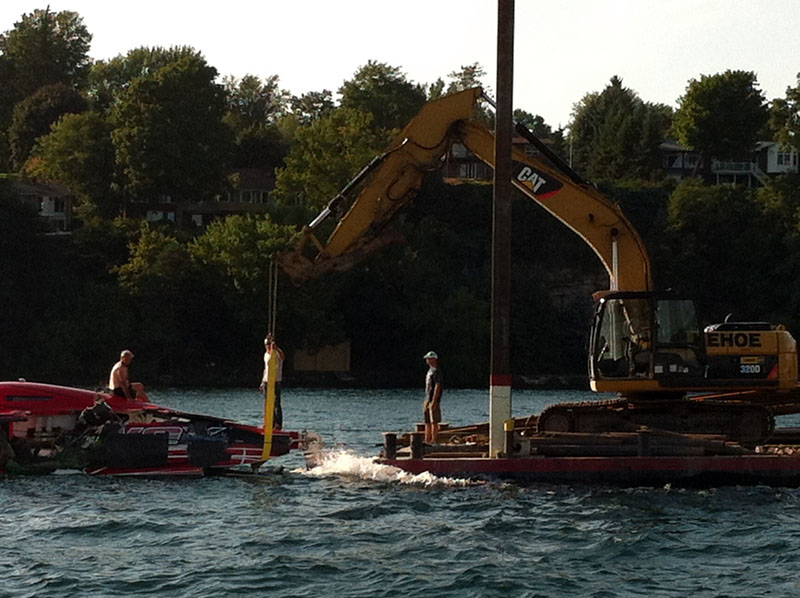 This photo shows the 50-footer being removed from the river after the incident.