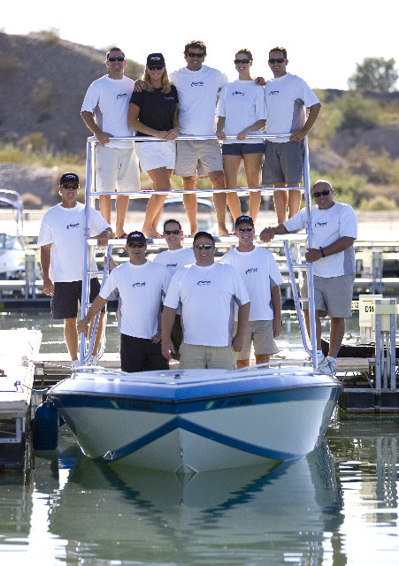 What would Newby do? Well, in this photo of the Powerboat magazine crew in 2007, he's position himself between two female staff members on the photo boat tower.