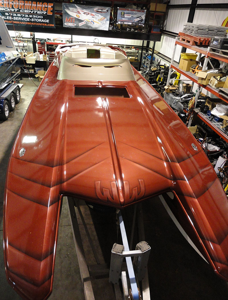The Waves and Wheels Ironman-themed Hustler 377 Talon is taking shape with extra special assistance from Performance Boat Center.