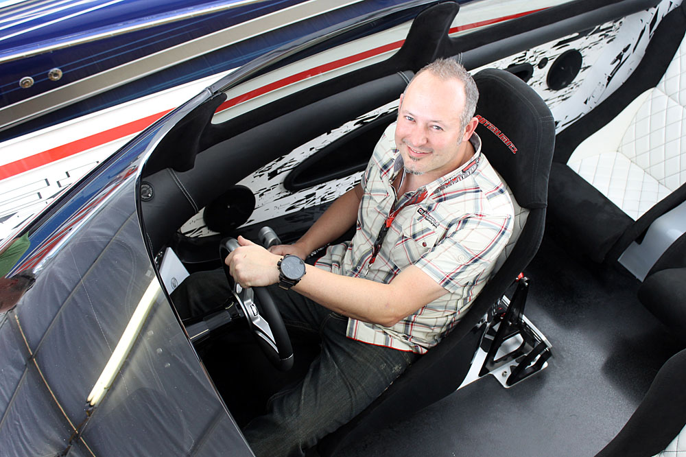 Dustin Whipple of Whipple Superchargers takes the helm of his new 43-foot Outerlimits V-bottom.