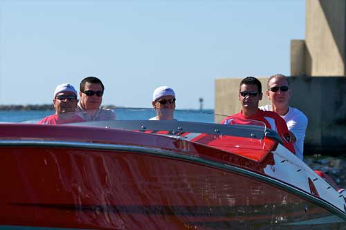 From left: Joe Sabo, Randy Cigar, Alex Nuez, Tony Desaro and author Matt Trulio in Sabo’s 38-foot Cigarette Top Gun powered by twin supercharged 1,050-hp Cobra engines. 